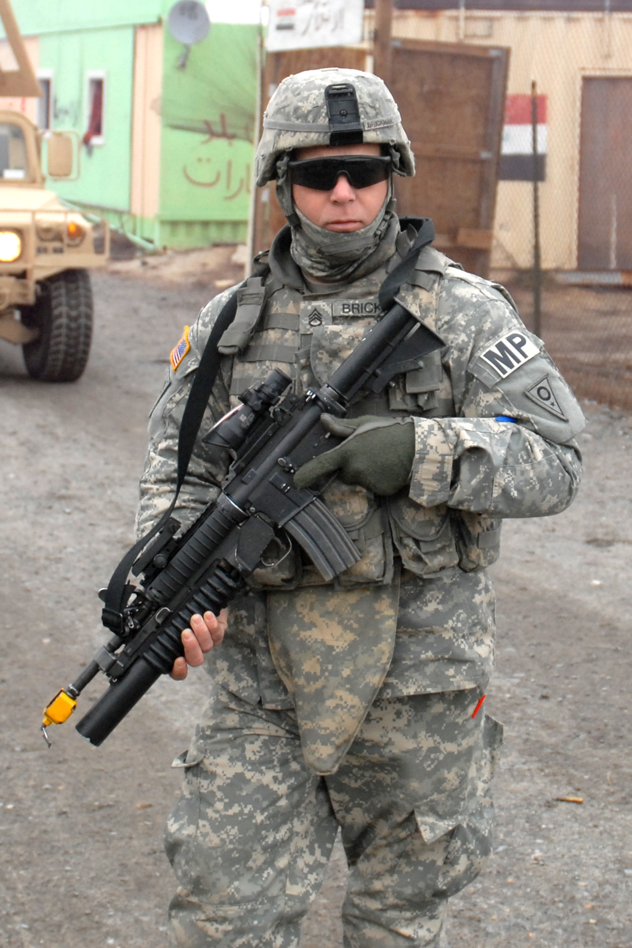 Military police wear the standard ACUs with a patch that says MP on ...